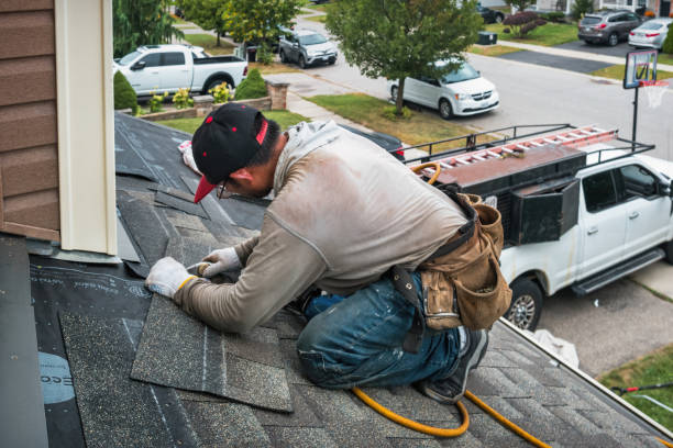 Professional Emergency Roof Repair technician working in Sayre, PA